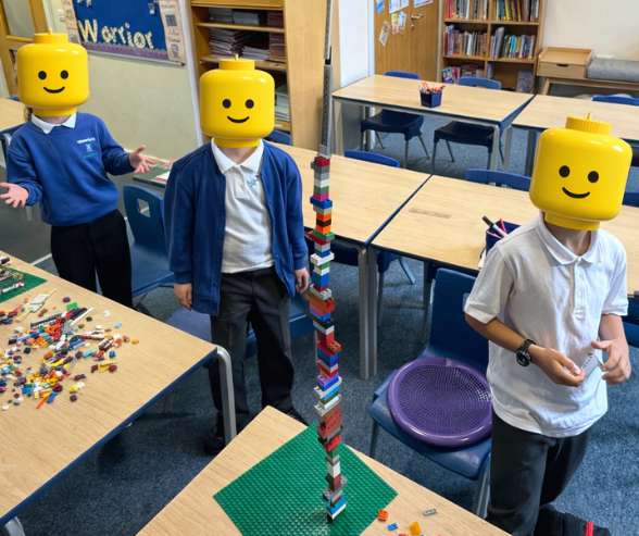 Children working together on a LEGO build